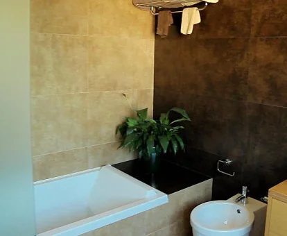 Foto de la bañera de hidromasaje que se encuentra en Albir Palace