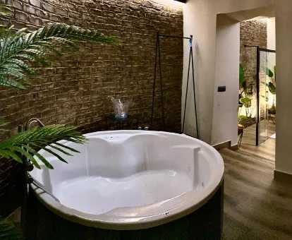 Foto de la bañera de hidromasaje que se encuentra en Alvarado Loft Rural