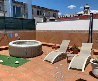 Foto del patico con jacuzzi del apartamento Apartments Madrid Principe 2