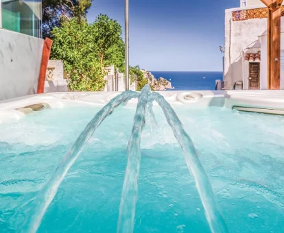 Foto del jacuzzi con vistas al mar del apartamento Costa Nova