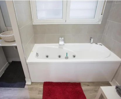 Foto de la bañera de hidromasaje del apartamento Windrose 9