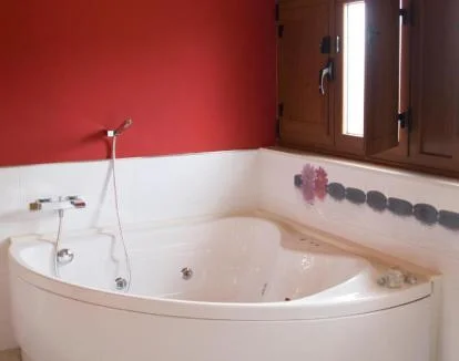 Foto del moderno y amplio Apartamento Deluxe totalmente equipado con jacuzzi privado.