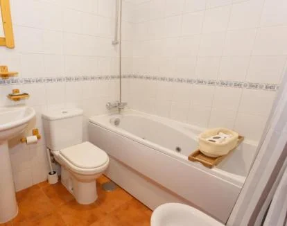 Foto de la Casa de dos dormitorios con jacuzzi privado y todo lo necesario para una estancia perfecta.