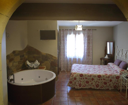 Foto de la habitación con jacuzzi de la Casa Rural La Tejada