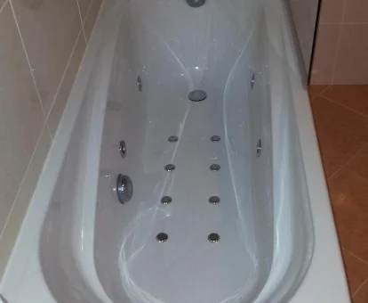 Foto de la bañera de hidromasaje del Hotel AV Apartamentos Lobios