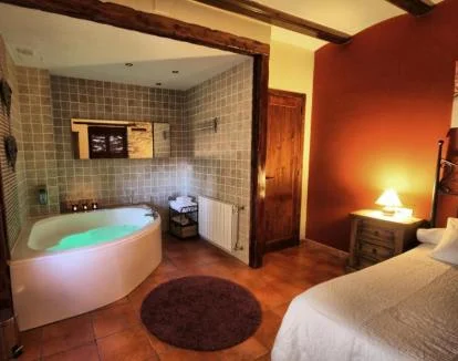 Foto del Apartamento de un dormitorio con estilo rústico y jacuzzi privado.