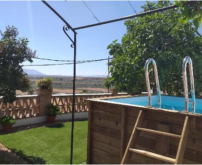 Piscina al aire libre del chalet con spa Casa Cueva Pastor en Fontanar