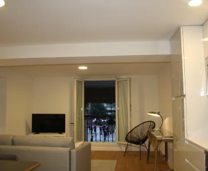 Sala de estar del apartamento con servicios de masaje El Reloj en San Sebastián