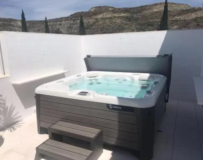 Foto del Apartamento Deluxe con jacuzzi privado en la terraza.