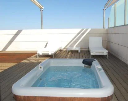 Foto de la Suite con terraza privada y jacuzzi al aire libre.