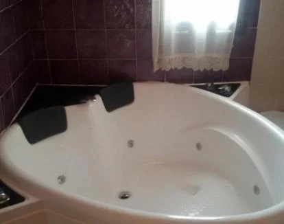 Foto de la Suite Deluxe con jacuzzi privado y hermosas vistas.
