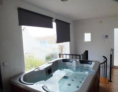 Foto de la Habitación Deluxe con jacuzzi privado en el baño.