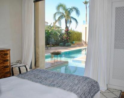 Foto de la Villa de un dormitorio con salida directa a la piscina.