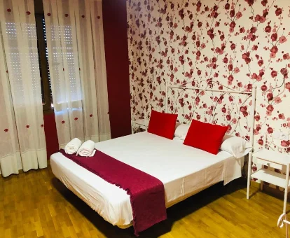 Foto de la habitación doble superior del Hostal Los Escudos 
