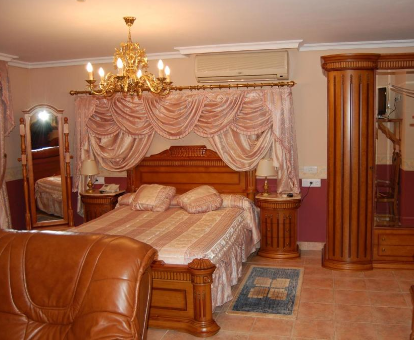 Foto de la cama que se encuentra en la Suite del Hotel Flor de la Mancha
