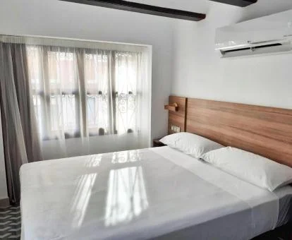 Una de las acogedoras habitaciones dobles de este hotel con encanto.