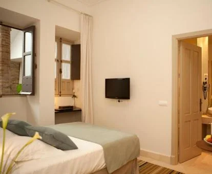 Una de las acogedoras habitaciones de este hotel con encanto.