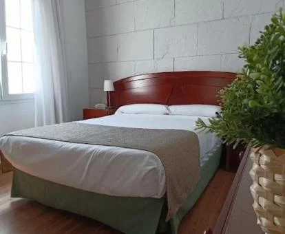 Una de las acogedoras habitaciones de este coqueto hotel.