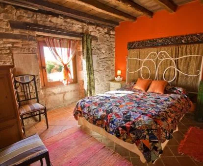 Una de las preciosas habitaciones de estilo rústico de este hotel con encanto.