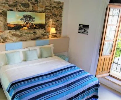 Una de las acogedoras habitaciones de este hotel con encanto.