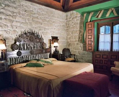 Una de las maravillosas habitaciones de estilo rústico de este precioso hotel.