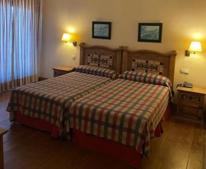 Una de las acogedoras habitaciones de este hotel rural ideal para descansar.