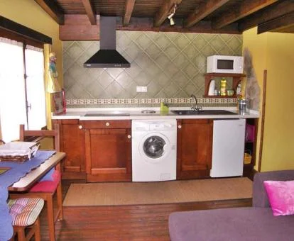 Interior de uno de los acogedores apartamentos rurales del establecimiento.