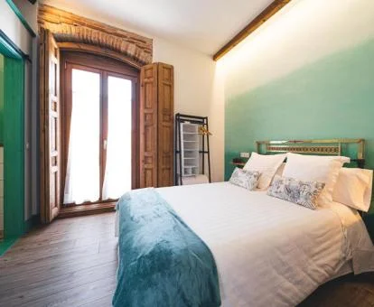 Una de las coquetas habitaciones de este hotel rural.