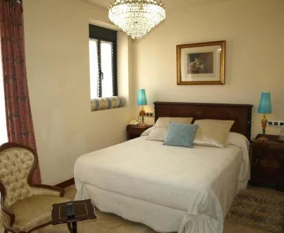 Una de las coquetas habitaciones dobles de este acogedor hotel rural.