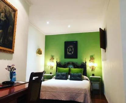 Una de las coquetas habitaciones de estilo tradicional del hotel.