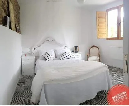 Una de las acogedoras habitaciones de este hotel con encanto.
