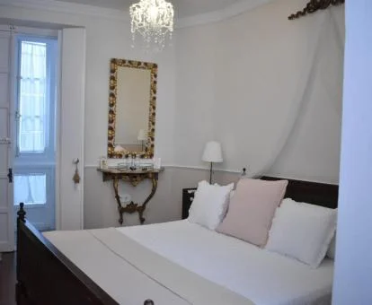 Una de las coquetas habitaciones de este hotel con encanto.