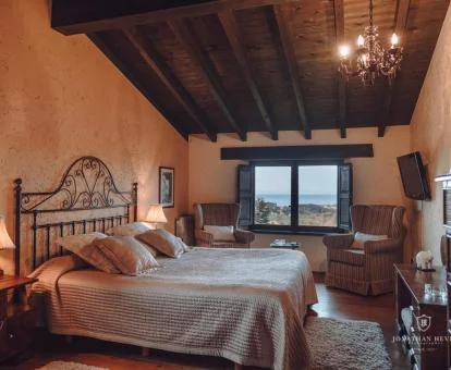 Una de las coquetas habitaciones con fabulosas vistas de este hotel con encanto.