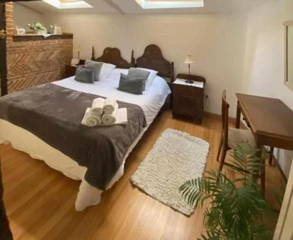 Dormitorio de esta coqueta casa rural con jacuzzi privado.