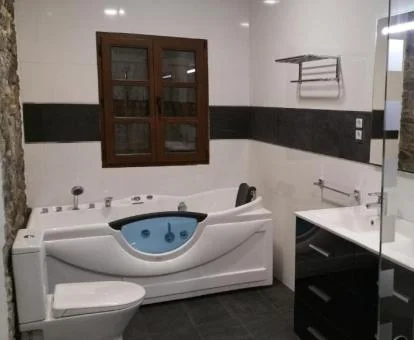 Fabuloso jacuzzi privado de la habitación doble Deluxe del hotel.