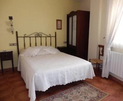 Una de las coquetas habitaciones de este hotel rural.